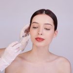 Beautiful woman receiving Restylane filler